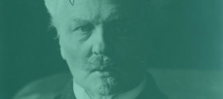 Fotografi av äldre man med mustasch och pipskägg