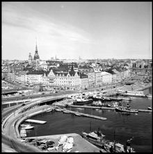 Franska Bukten och Skeppsbrokajen. Gamla Stan från taket Stadsgården 10