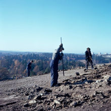 Anläggningsarbete på Högdalstoppen. Vy åt väster