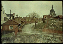 Stigbergsgatan (senare Sandbacksgatan) västerut mot Katarina kyrka 1922. I förgrunden den nedsprängda Renstiernas Gata