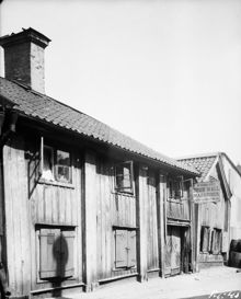 Bryggargatan 24. Aktiebolaget John Wall Magasiner. Nuv. kv. Kortbyrån