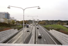 Huddingevägen söderut mot Östberga från tunnelmynningen mot Södra länken.