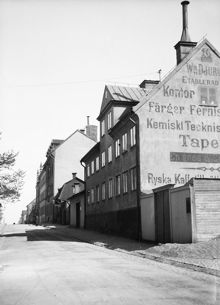 Fjällgatan 16-18. Reklamtext på gaveln