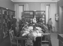 Västmannagatan 63, biblioteksinteriör med barn