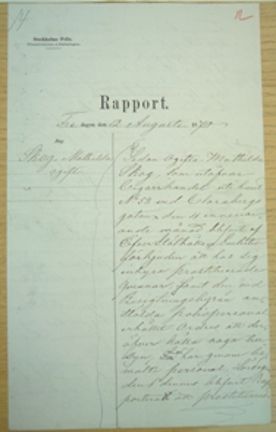 Handskriven rapport.