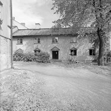 Skånegatan 14. Nödbostäder uppförda 1917 inför rivning. Nuvarande Rosenlundsparken