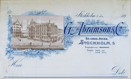 tryckt fakturahuvud i svart och blått med bild och text