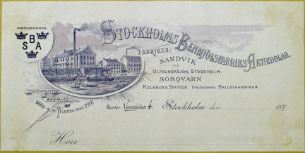 Fakturahuvud tryckt i blått med bild av fabriksexteriör samt text.