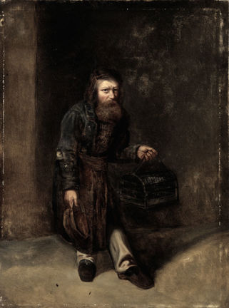 En man i historisk dräkt med en fågelbur