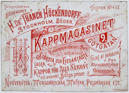 Reklamtryck i rött med blommor och text.