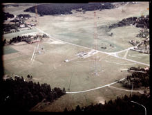 Flygbild västerifrån över radiomasterna i Spånga 1936