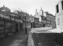 Kungsholmsgatan 1, 3, 5 och 7. På höjden i fonden ligger nu Kungsklippan med Stadsarkivet