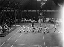 Olympiska spelen i Stockholm 1912. Manlig gymnastikuppvisning inför kunglig publik.