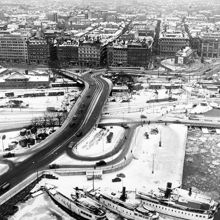 Stadshusbron österut mot Vasagatan. Utsikt från stadshustornet över Klara Mälarstrand, Tegelbacken och Klarakvarteren