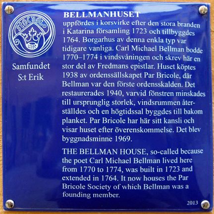 Blå emaljskylt.