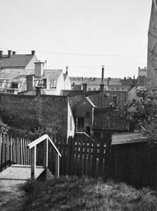 Gårdssidan av Brännkyrkagatan 78 sedd från Tavastgatan 61 söderut. Ungefär vid nuvarande Brännkyrkagatan 74-76, kv Haren